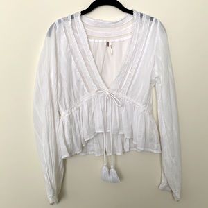Free People white long sleeve blouse with tassel tie